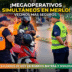 Operativo de control de tránsito y seguridad en Merlo, policía y agentes municipales controlando a un motociclista en la calle para prevención de delitos.
